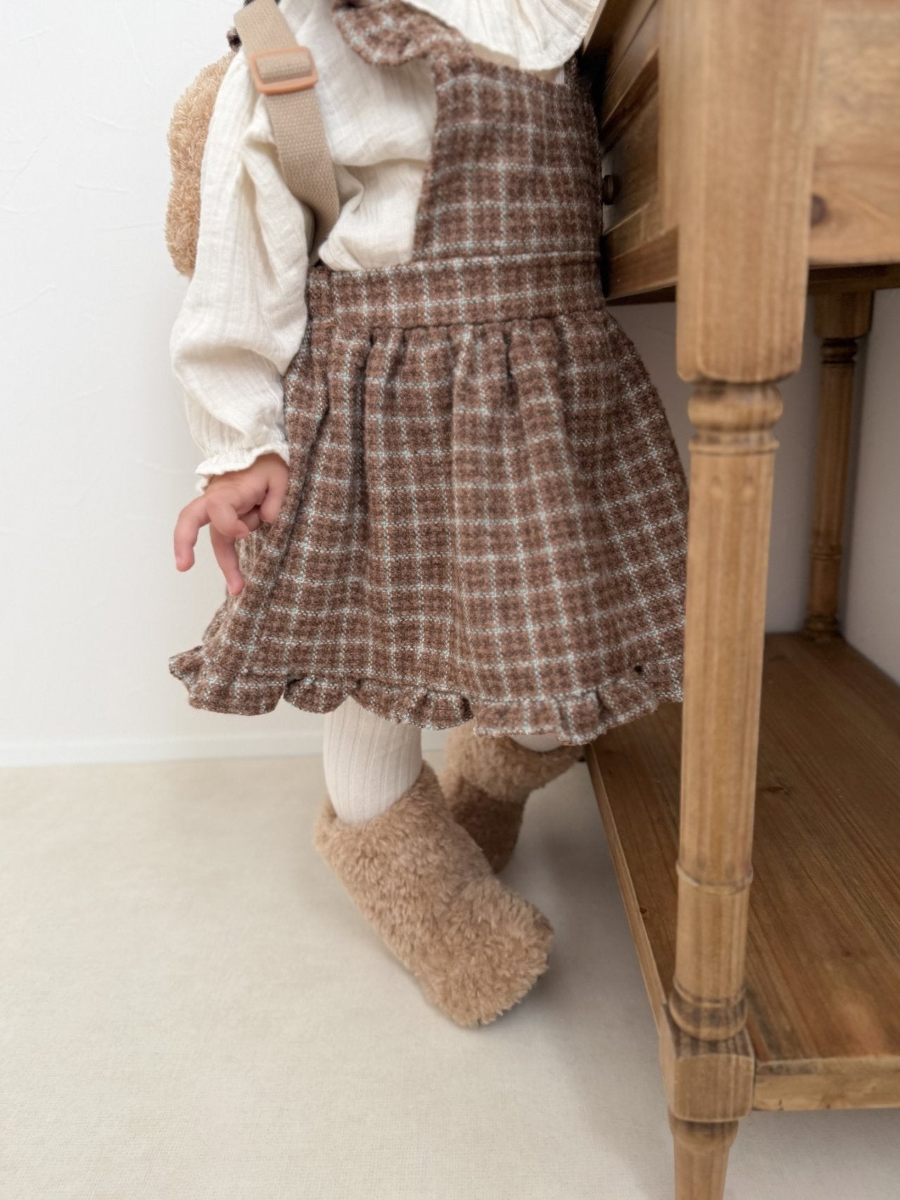 Check suspender one piece