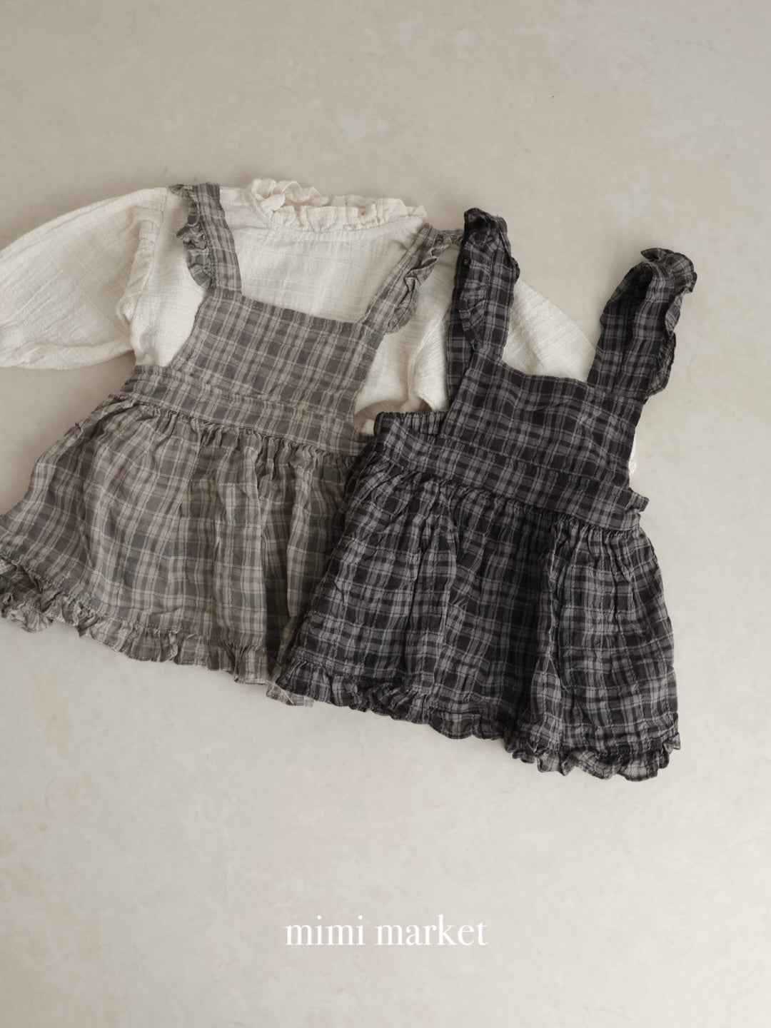 Check frill one piece