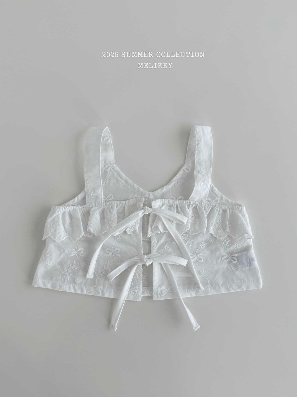 Nana frill vest