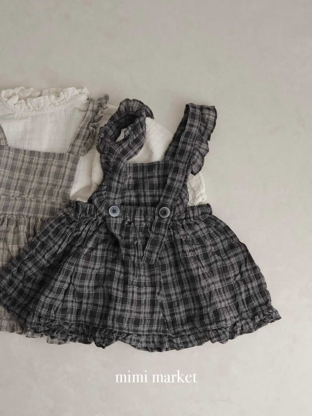 Check frill one piece