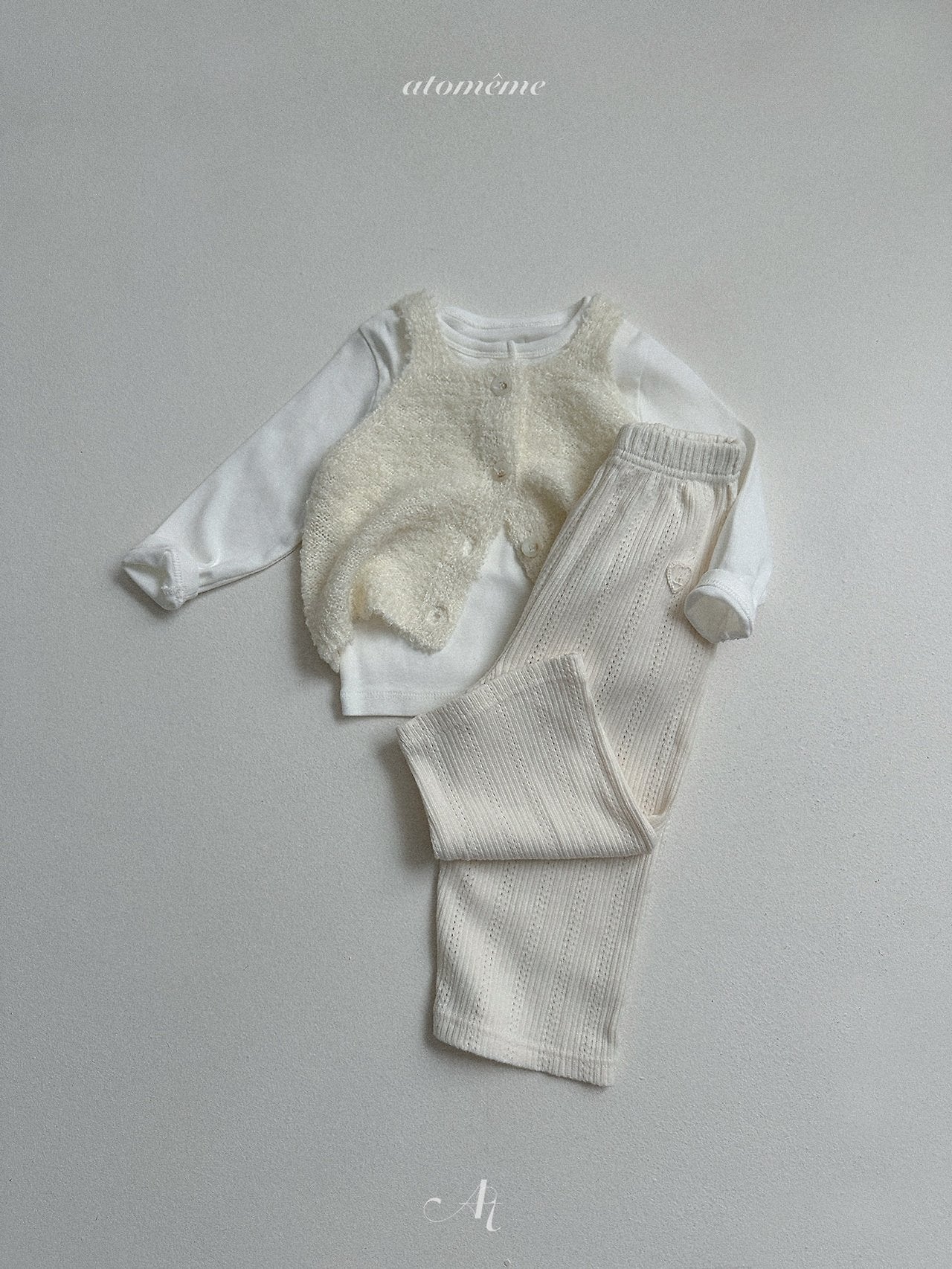 Ecru knit vest