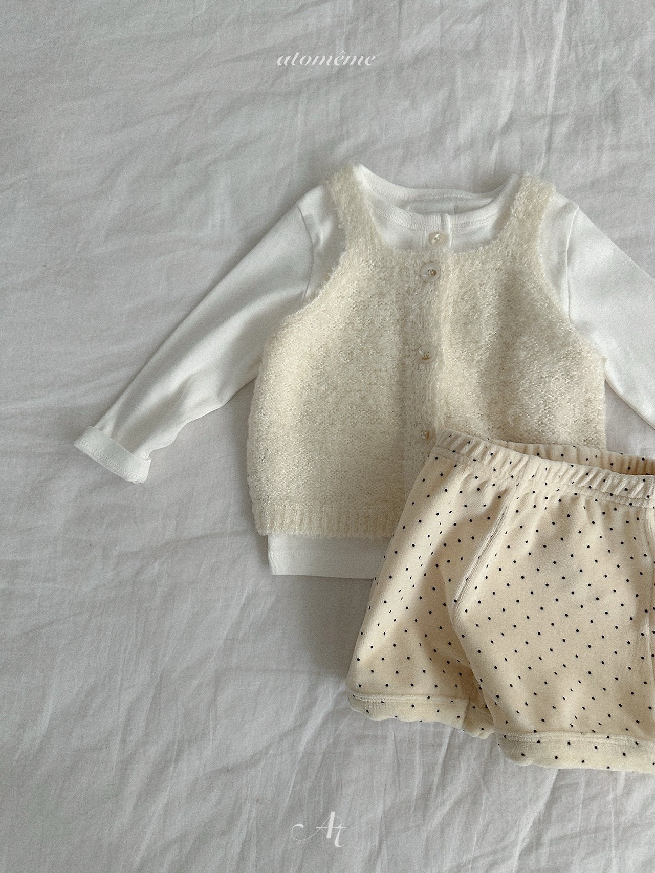 Ecru knit vest