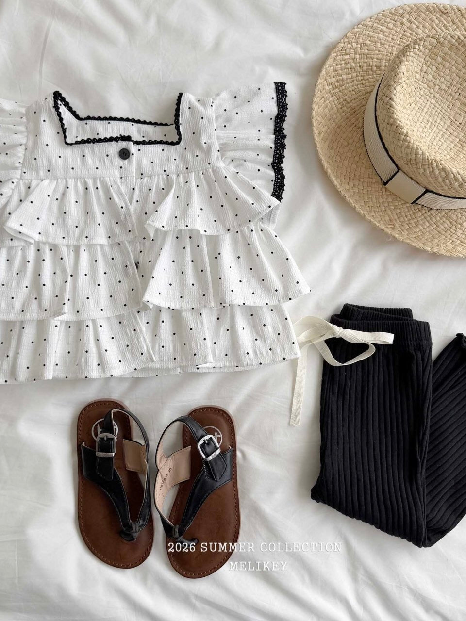 Dot tiered sleeveless top