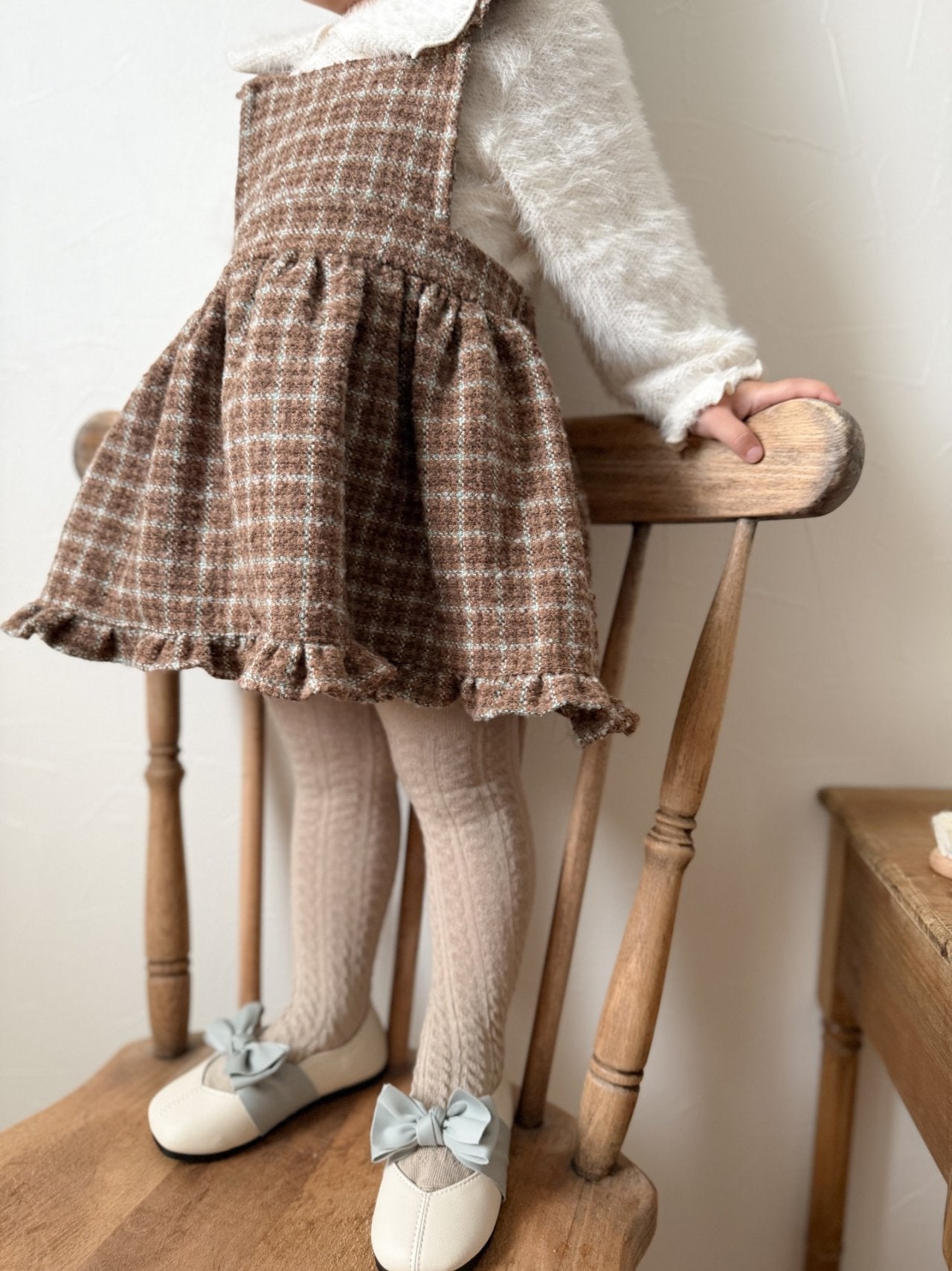 Check suspender one piece