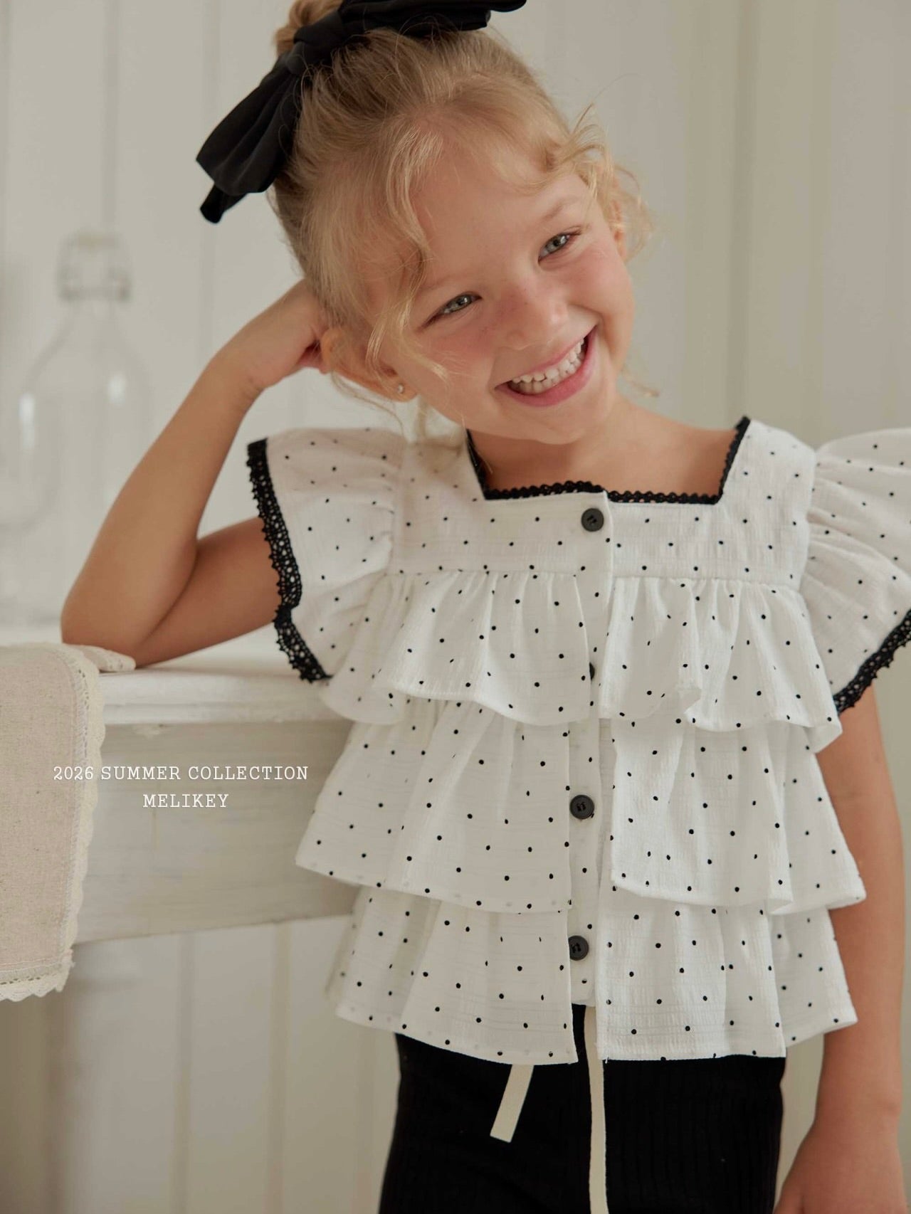 Dot tiered sleeveless top