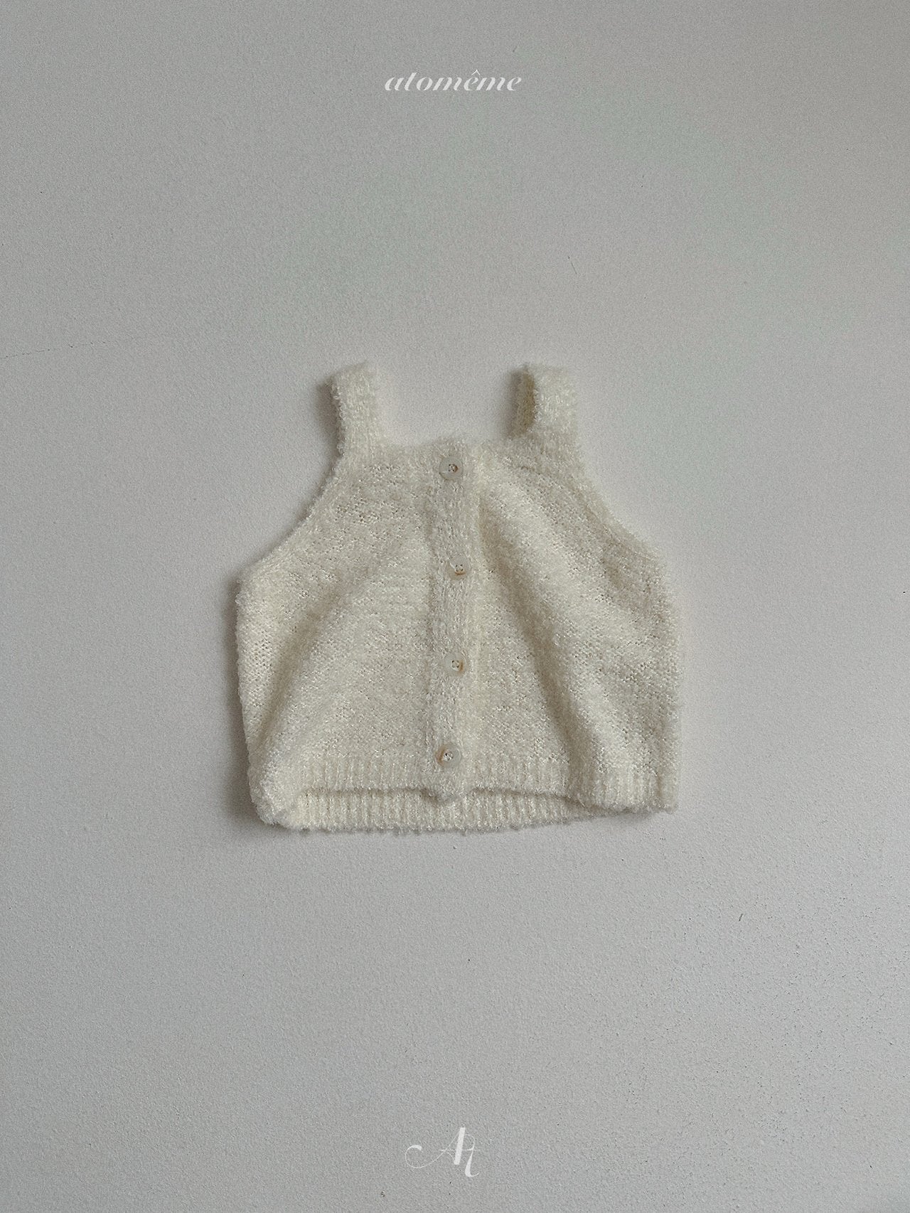 Ecru knit vest