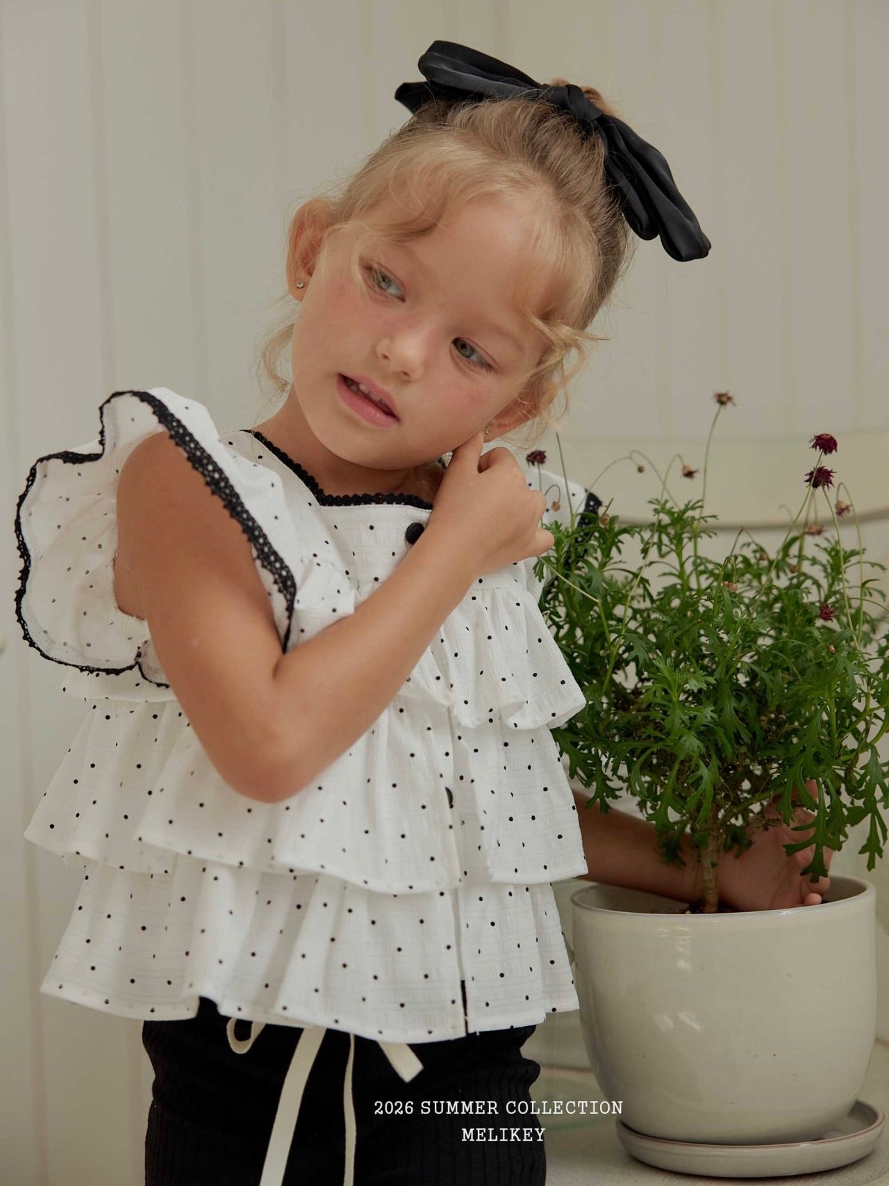 Dot tiered sleeveless top