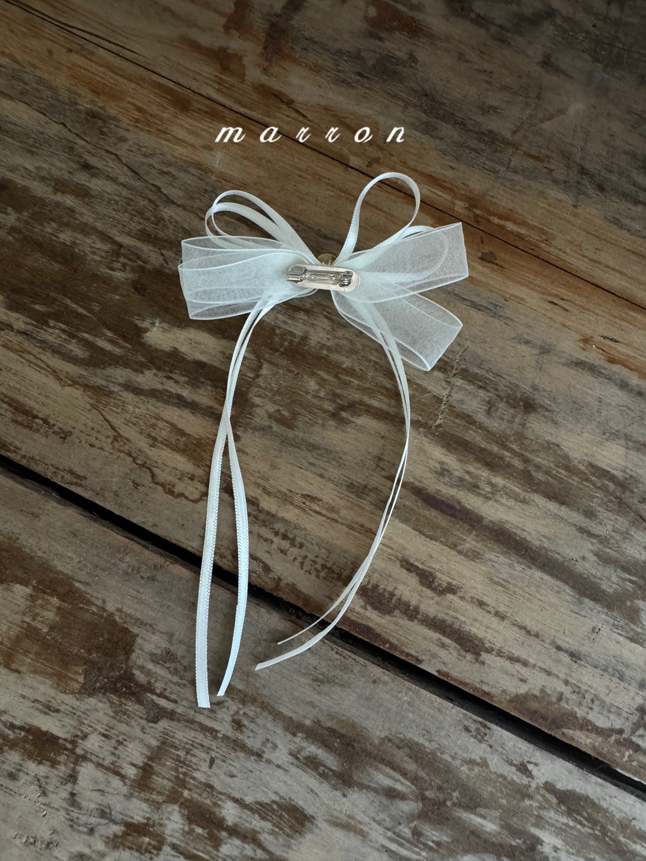 Pearl ribbon brooch