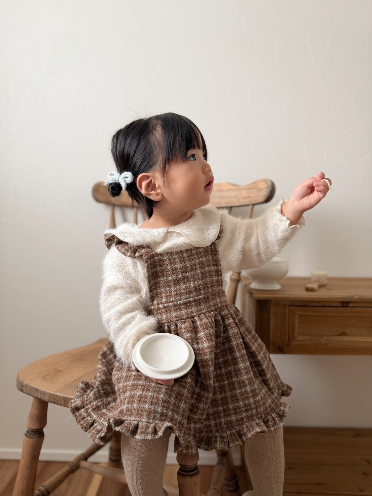 Check suspender one piece