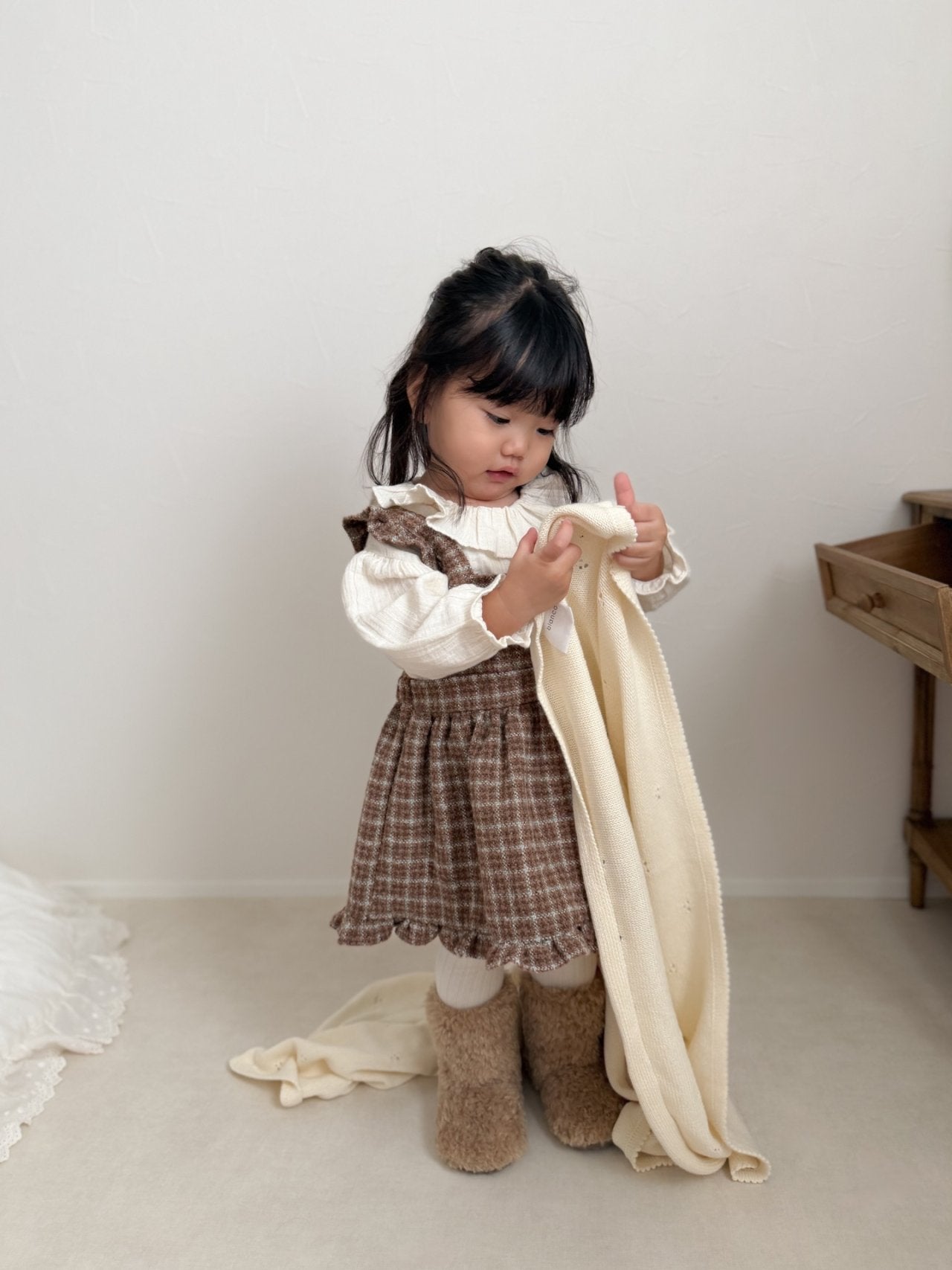 Check suspender one piece