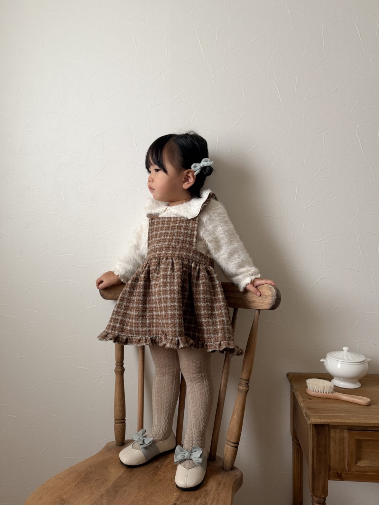 Check suspender one piece