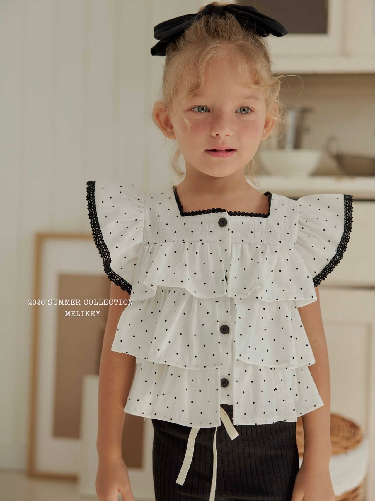 Dot tiered sleeveless top