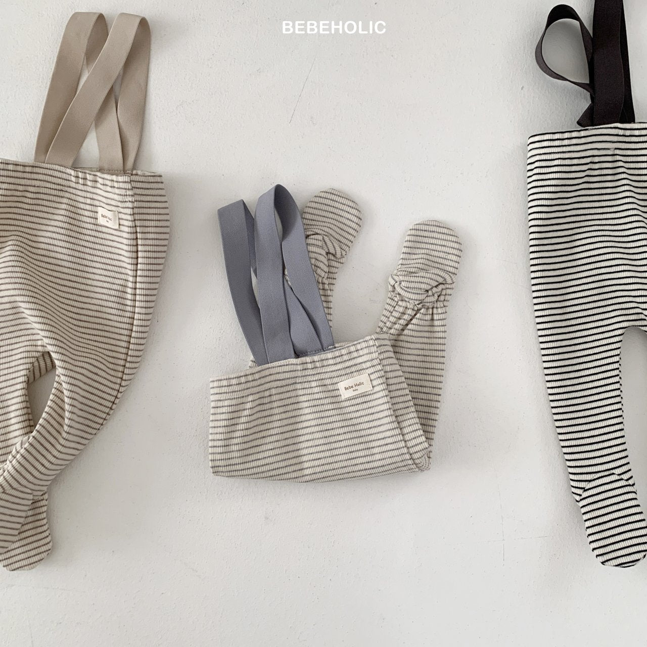 Bebe stripe suspender leggings